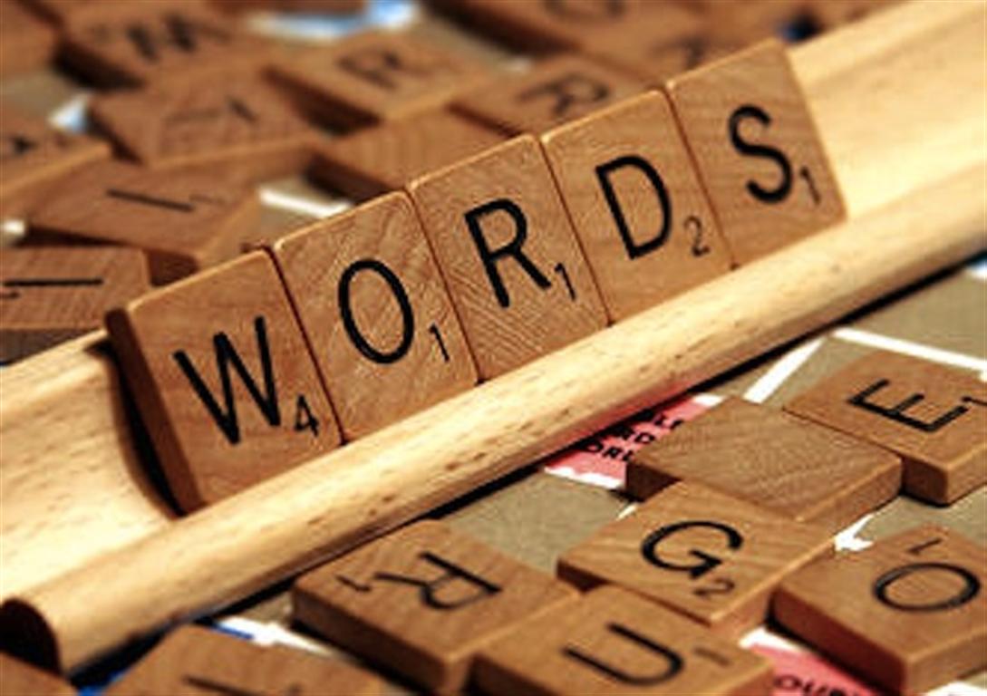 Sisters Enjoy The Intensity And Challenge In A Good Game Of Scrabble