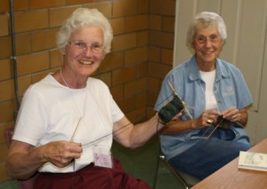 Sisters Jean Fuqua, left, and Jeanne Knoerle participate in knitting socks at Fiber Frolic 2006.