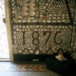wall mosaic of shells forming the numbers 1876