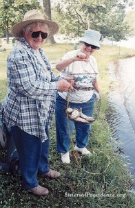 Sister Mary Pat Peacock and her friend Sister Marian Ruth Johson fishing in St. Joseph Lake at Saint Mary-of-the-Woods in 2004.