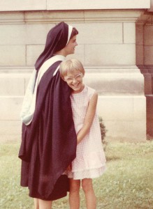 Sister Denise Wilkinson hugs her cousin Mary on the day when Sister Denise, as a young professed sister, graduated from Saint Mary-of-the-Woods College.