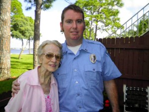 Bradenton, Fla., EMT Andrew Powers visits with Sister Margaret Louise Bernard on Aug. 19. 