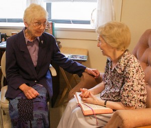 Sister Catherine Livers visits with Sister Ellen Catherine Conroy in 2004 as a volunteer in Ministry of Care.