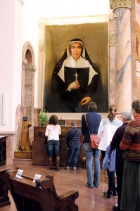 Fest attendees praying at the interim Shrine of Saint Mother Theodore.