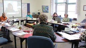 Vicki takes minutes at a Providence Associates board meeting.