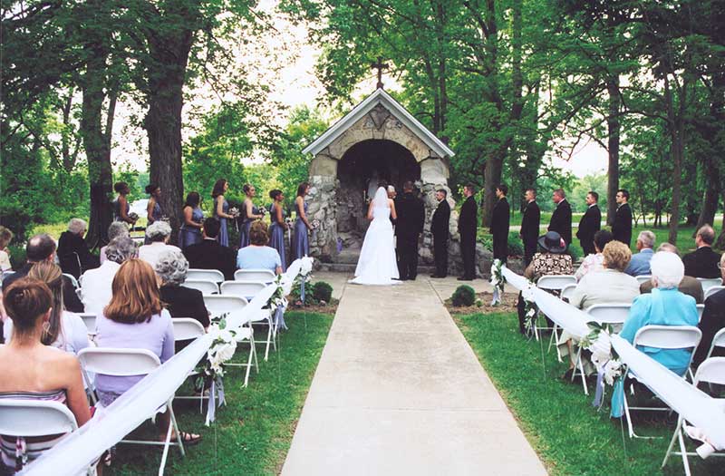 wedding in front of the grotto