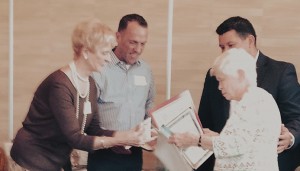 Sister Carol Nolan receives her Volunteer of the Year award from the Democratic Women of the Desert.
