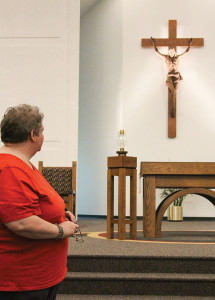 Sister Mary Ann DeFazio in her ministry as pastoral associate at St. Christopher parish in Speedway, Ind.