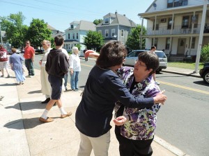 Sister Jane greets a parishioner after Mass at St. John the Evangelist Parish.