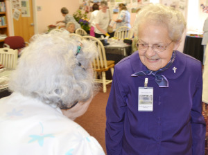 Sister Joanne Cullins greets a visitor.
