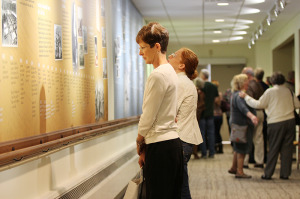 Saturday visitors read through the timeline.