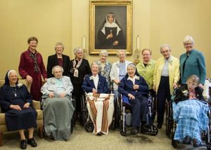 Several Sisters of Providence celebrated Jubilees in December. They were honored at a celebration with the Sisters of Providence General Council. The sisters celebrating Jubilees included (front, from left) Sisters Helen Dolores Losleben, Mary Loyola Bender, Agnes Arvin, Rosalie Marie Weller, Catherine Arkenberg, (back) General Council members Sisters Dawn Tomaszewski, Jenny Howard and General Superior Sister Denise Wilkinson, Sister Rose Marita Riordan, Sister Bernadette Mary Carroll, General Council member Sister Mary Beth Klingel, Sister Mary Imelda Coulup and General Council member Sister Lisa Stallings.