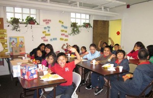 Students in the after school homework club at Providence Family Services in Chicago celebrate "Sister Dorothy Day" in 2012 when Sister Dorothy retired from her ministry coordinating the program.