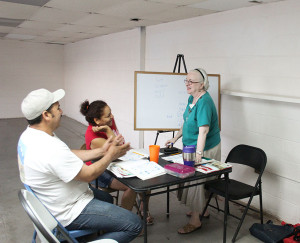 Sister Loretta Picucci, right, teaches an English class for Providence in the Desert at the Sunbird Trailer Park in Thermal, California.