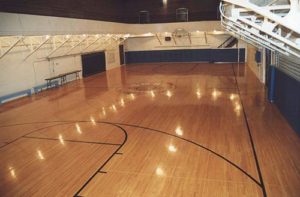 An inside photo of the basketball court inside the "Old Gym."