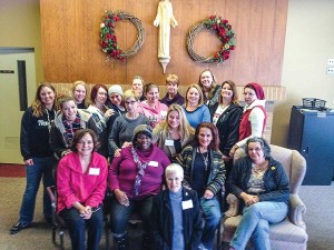 Sister Connie Kramer, front center, creates one more memory with these retreatants as they complete their retreat experience. 