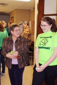 Sister Paula Damiano shares a moment with a student at St. Patrick School.
