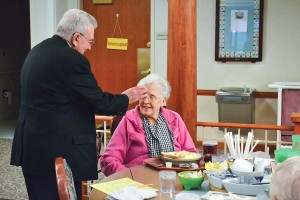 Father Dan blesses Sister Mary Patricia Cummings (formerly Sister Marie Janice).