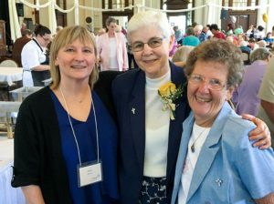 Providence Associate Suzie Ray at the Woods for the Providence Associate annual meeting visits with two of her first bosses again after 36 years. Sister Mary Jo Piccione, center, celebrates her golden jubilee and Sister Josephine Bryan.