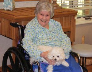 Sister Marian Ruth with Benny the Dog at Providence Health Care.
