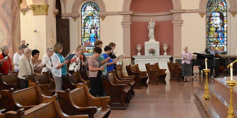 sisters singing during Mass