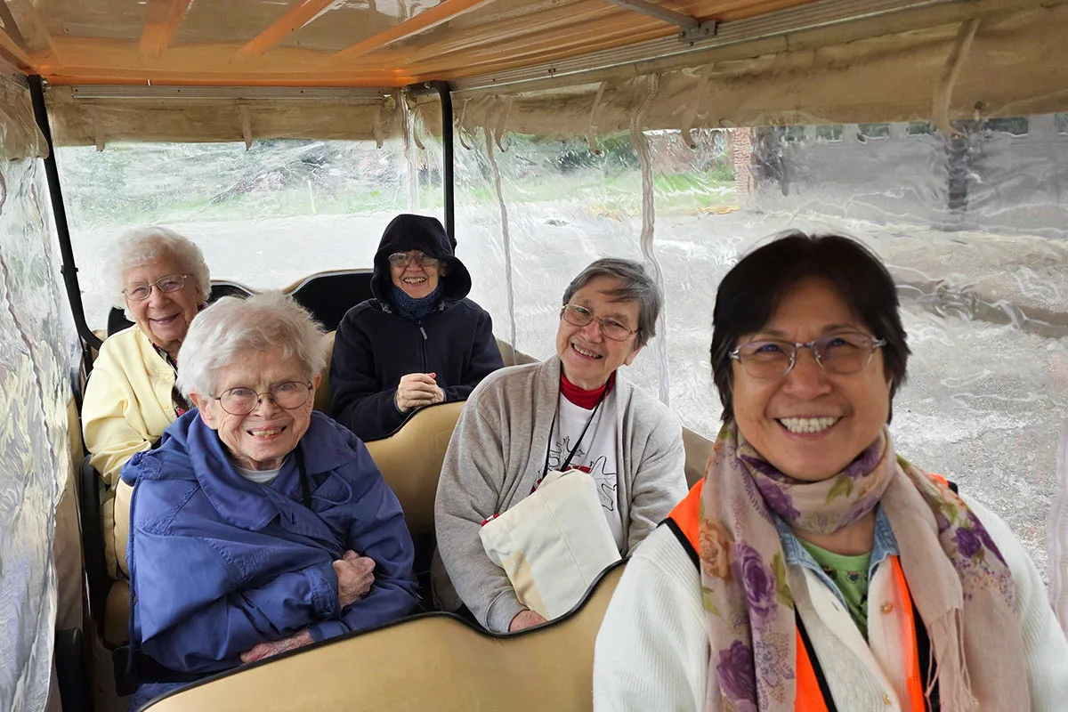 Pope Francis smiling and waving