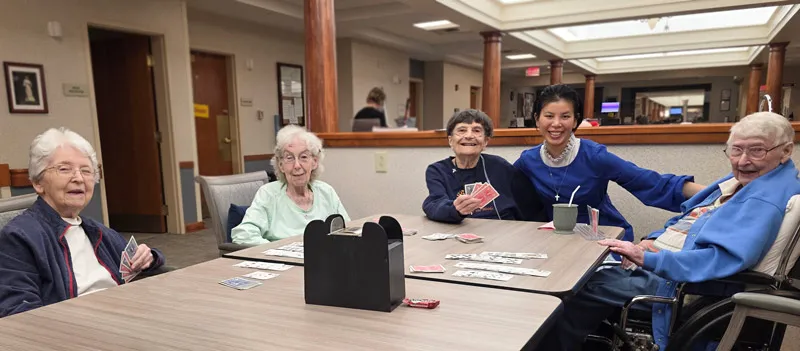 (From left) Sisters Margaret Quinlan, Gloria Memering, Mary Lou Ruck, Ann Duong and Dorothy Ellen Wolsiffer enjoying 
each other’s company while playing a game of cards.