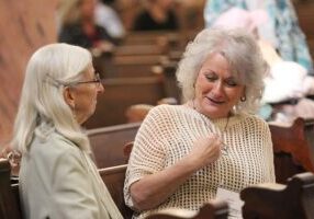 Providence Associate Helen Knight (right) speaking with companion Sister Dorothy Rasche.