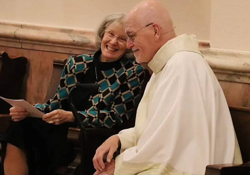 General Superior Sister Jeanne Hagelskamp sharing a moment with Father Terry Johnson.