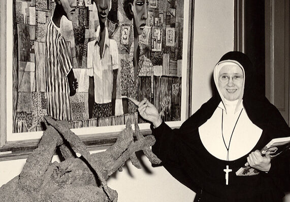 Sister Esther Newport, a native of Terre Haute, with one of her paintings.