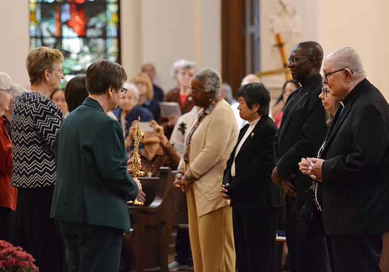 Representatives from the five Dioceses in Indiana preparing to receive their first-class relic.