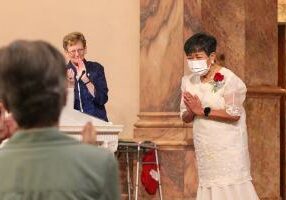 Sister Evelyn Ovalles (right) thanks the congregation while General Superior Sister Dawn Tomaszewski (left) looks on.