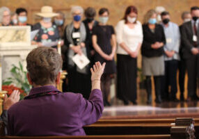 General Superior Sister Dawn Tomaszewski and all those gathered bless the new associates.