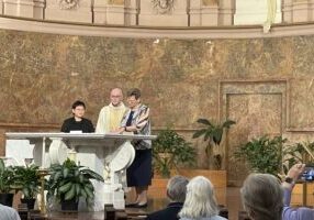 Sister Leslie Dao (from left), Father Terry Johnson and General Superior Sister Dawn Tomaszewski.