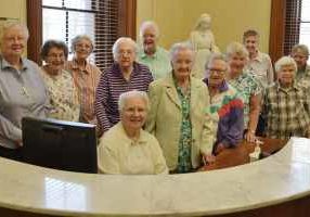 Many of the Sisters of Providence who volunteer in the Providence Hall phone room included (seated) Sister Mary Joan Schaefer and (standing, from left) Sisters Kay Manley, Dorothy Gartland, Barbara Bluntzer, Mary Ann Phelan, Carolyn Bouchard, Noralee Keefe, Carol Lindly, Lucille Lechner, Claire Hanson, Carol Nolan and Donna Butler.