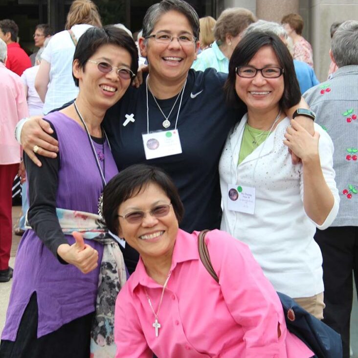Sister Editha Ben, front, with some women in formation with the Sisters of Providence, from left, Sisters Anna Fan, Joni Luna, My Huong Pham