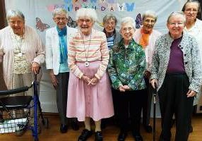 The sisters of Lourdes Hall gather for a group photo: from left Sisters Suzanne Buthod, Lois Ann Stoiber, Florence Norton, Winifred Mary Sullivan, Adele Beacham, Rita Clare Gerardot, Emily Walsh and Agnes Maureen Badura